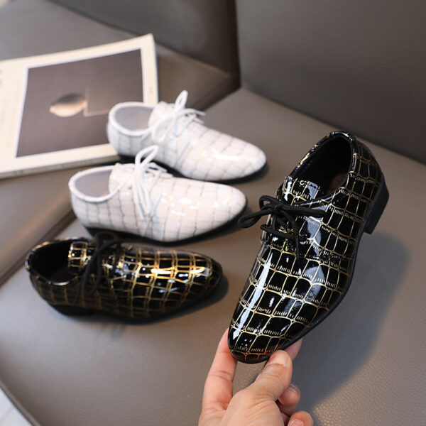 Stylish grid pattern boys oxford shoes perfect for formal occasions High quality leather comfortable fit Shop Newness