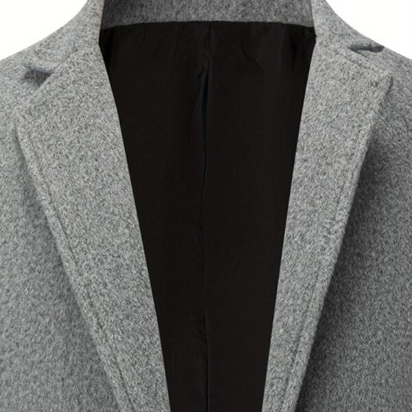 Newness Metropolitan Slim Fit Blazer: A versatile navy blazer for men, perfect for both casual and formal occasions. Model showcasing the slim fit and tailored design.