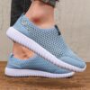 Newness Breathable Mesh Slip On Sneakers in white showcasing the breathable mesh upper and easy slip on design Perfect for everyday wear