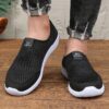 Newness Breathable Mesh Slip On Sneakers in white showcasing the breathable mesh upper and easy slip on design Perfect for everyday wear