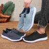 Newness Breathable Mesh Slip On Sneakers in white showcasing the breathable mesh upper and easy slip on design Perfect for everyday wear