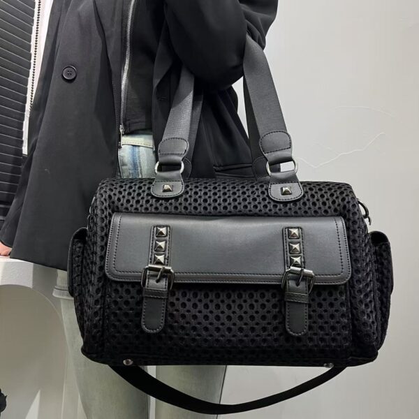 Newness Urban Edge Nylon Tote Bag, a stylish and versatile black nylon tote bag perfect for work, commuting, or evenings out. The bag features clean lines and a modern design.