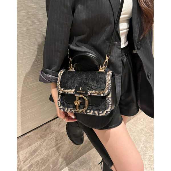 Newness Uptown Black Shoulder Bag: A sleek, black shoulder bag, perfect for everyday use or a night out. Made of high-quality materials.