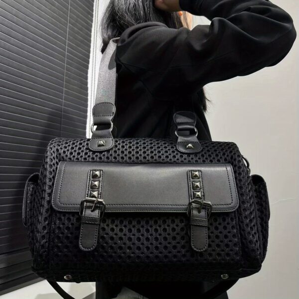 Newness Urban Edge Nylon Tote Bag, a stylish and versatile black nylon tote bag perfect for work, commuting, or evenings out. The bag features clean lines and a modern design.