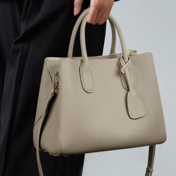 The Cairo Beige Urban Tote from Newness, a stylish beige handbag with oiledge detailing, perfect for everyday use.