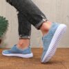 Newness Breathable Mesh Slip On Sneakers in white showcasing the breathable mesh upper and easy slip on design Perfect for everyday wear