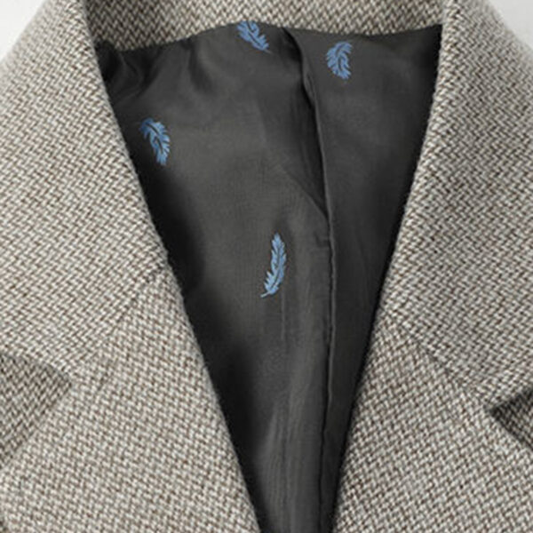 Newness Metropolitan Men's Tweed Blazer in luxurious tweed fabric, perfect for spring and fall. Model wears a classic men's blazer, ideal for smart casual or formal events.