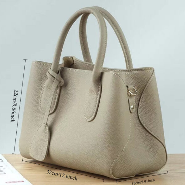 The Cairo Beige Urban Tote from Newness, a stylish beige handbag with oiledge detailing, perfect for everyday use.