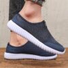 Newness Breathable Mesh Slip On Sneakers in white showcasing the breathable mesh upper and easy slip on design Perfect for everyday wear