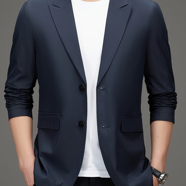 Newness Metropolitan Men's Casual Suit Jacket in versatile navy blue, modeled on a man striding confidently through a city street. The jacket is shown to highlight its sophisticated style and comfortable fit, perfect for spring or autumn.