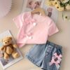 Adorable girls denim set with sweetheart neckline and bow detail perfect for playdates or school