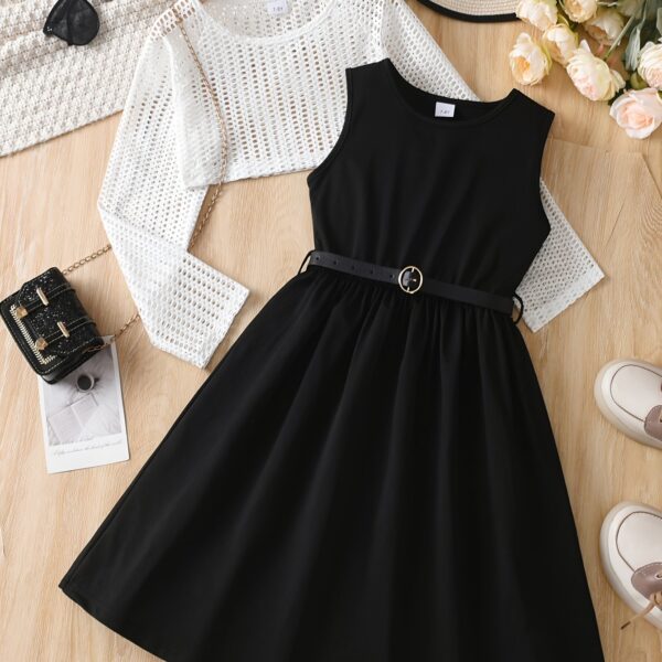 Adorable girls' summer dress set from Newness, featuring a stylish top and skirt, perfect for warm weather.