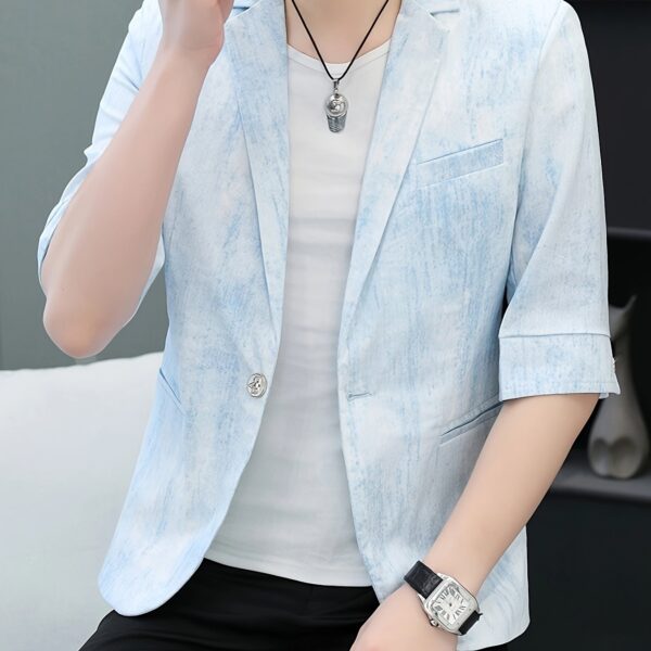 The Newness Dubai Breeze Men's Summer Blazer in a stylish pose on a model.